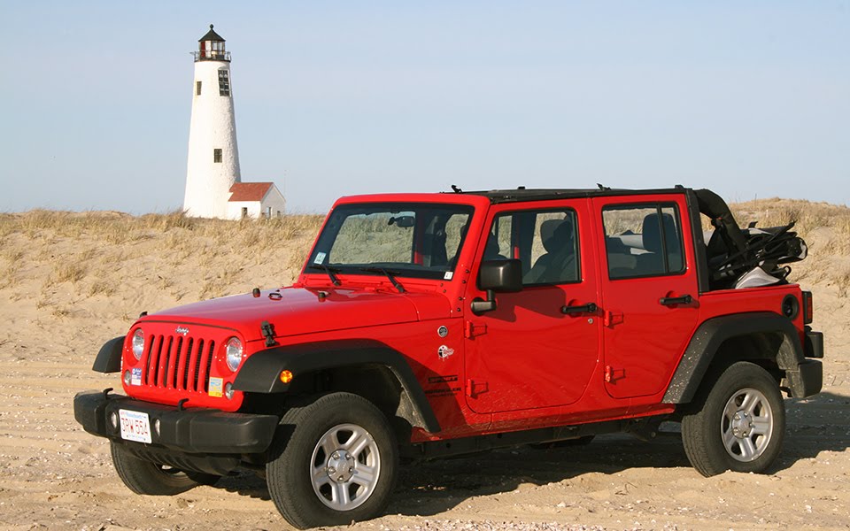 Jeep driving on the beach on nantucket